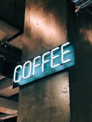 Quirky neon coffee sign - kind of like us.