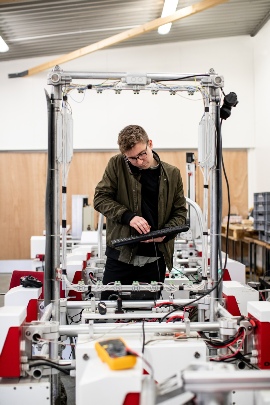 Robotics Team Member Working on Project